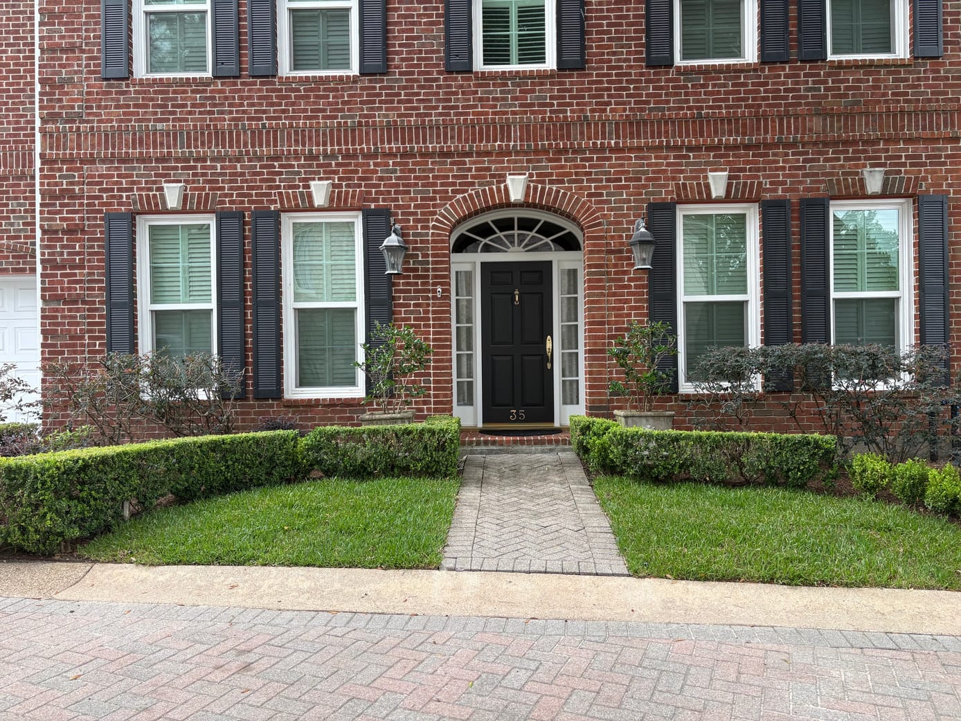 Reed residence, Memorial — newly installed sod and refreshed boxwood beds